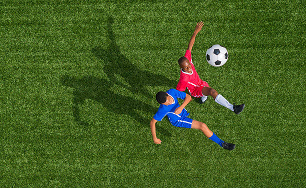 istock Young Footballers In Action 496917709