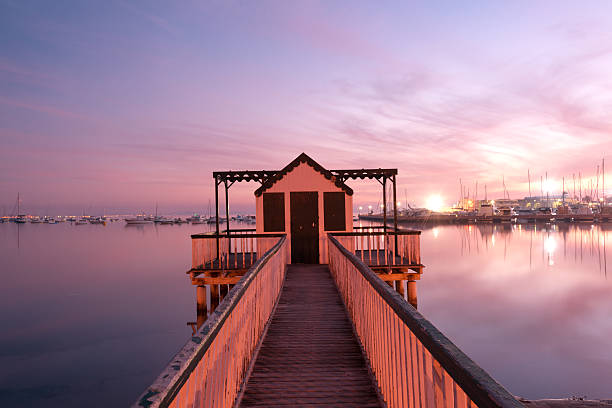 Beach cabin on San Pedro del Pinatar coast, Spain at sunset
