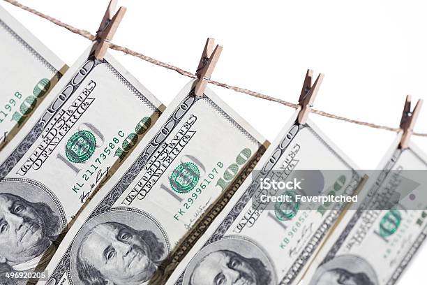 Hundred Dollar Bills Hanging From Clothesline On White Stock Photo - Download Image Now