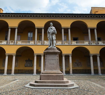 Pavia, Italy - August 18, 2015: Pavia (Lombardy, Italy): court of the historic University, built over 650 years ago