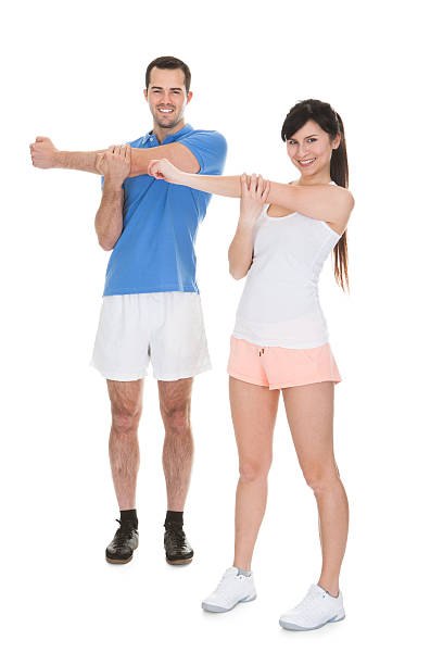 istock Portrait Of Couple Exercising 496920988