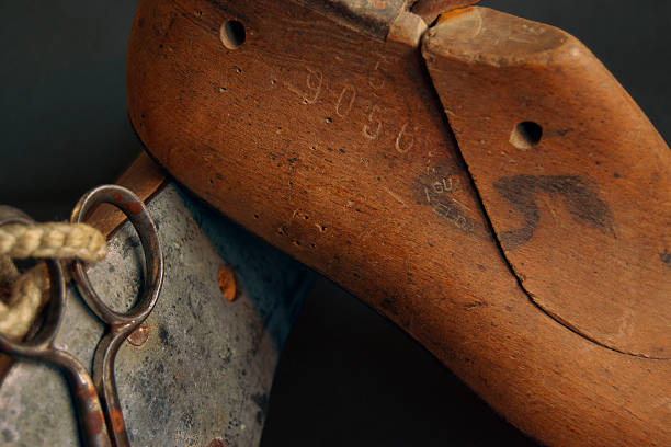 istock Still life with antique shoe lasts and scissors 496921241