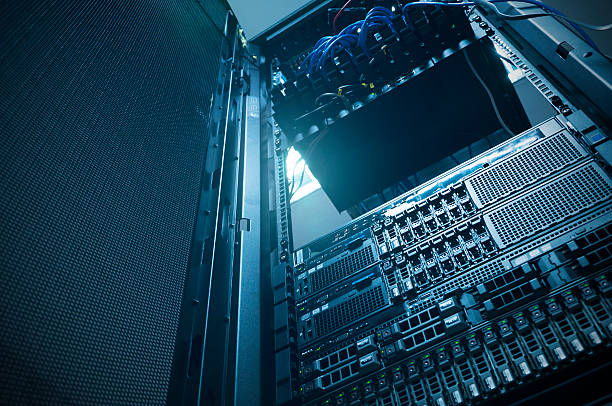 istock Bottom view of rack server against neon light flare 496921280