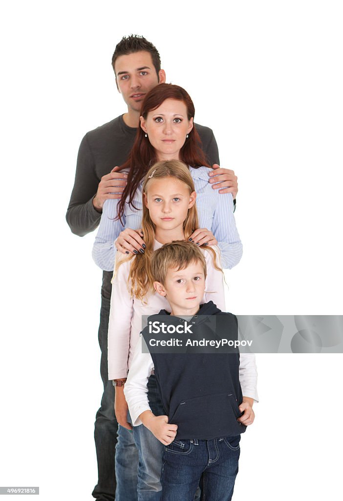 Portrait of happy family with their children Happy family with their children. Isolated on white 2015 Stock Photo