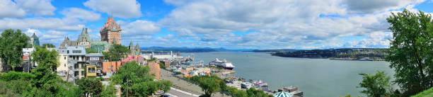 Quebec City cityscape panorama with cloud, blue sky and historical buildings.