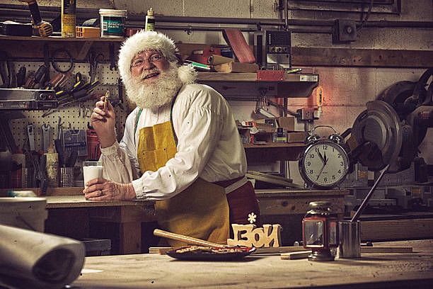 Real Santa Claus taking break from working in his workshop