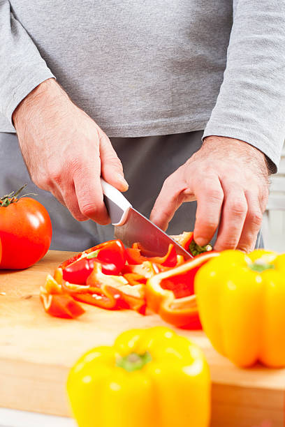 istock Preparing fresh organic food. Cutting vegetables 496923152