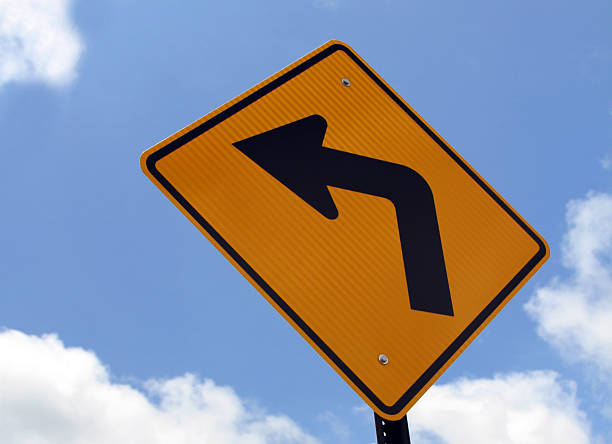 istock Turn lest sign & Orange Turn Left sign 496923963