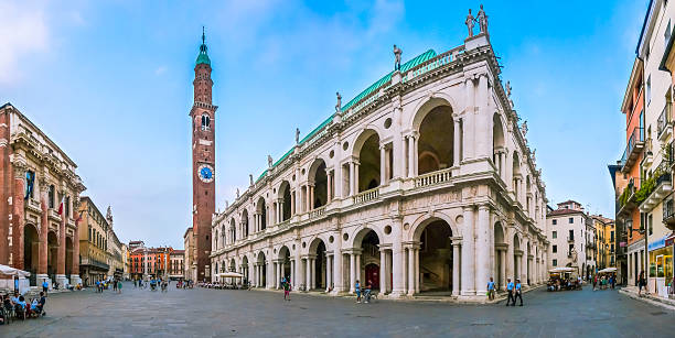 Famous Basilica Palladiana with Piazza Dei Signori in Vicenza, Italy Panoramic view of famous Basilica Palladiana (Palazzo della Ragione) with Piazza Dei Signori in Vicenza, Veneto, Italy basilica stock pictures, royalty-free photos & images
