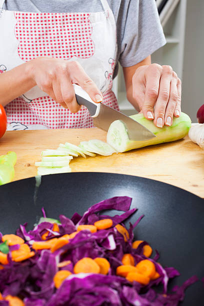 istock Preparing fresh organic food. Cutting vegetables 496924538