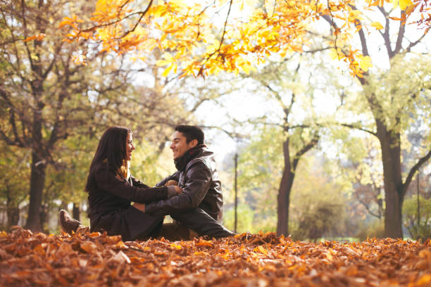 istock Smiling couple having fun in the park. 496925236