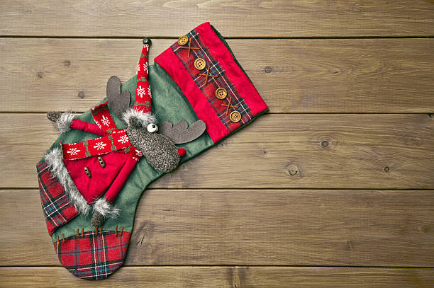 istock Christmas boot with a deer and an ornament 496927402