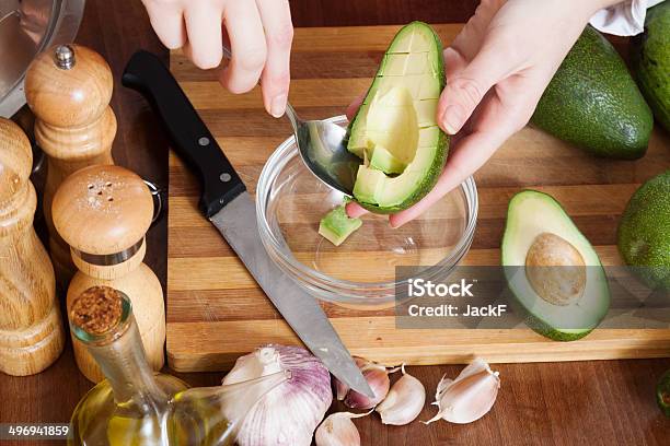 Female Hands Cooking With Avocado Stock Photo - Download Image Now - Avocado, Cutting, Adult