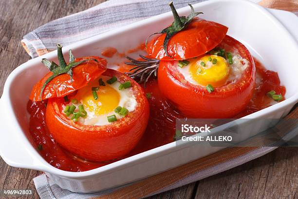 Eggs Baked In Tomato Top View Close Up Stock Photo - Download Image Now - Appetizer, Baked, Biology