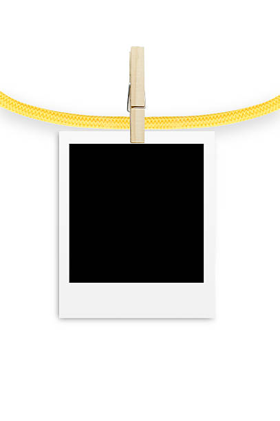 marco de fotos con pinza de colgar la ropa aislado sobre fondo blanco - hang to dry audio fotografías e imágenes de stock