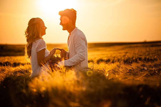 istock Couple in wheat field 496944253