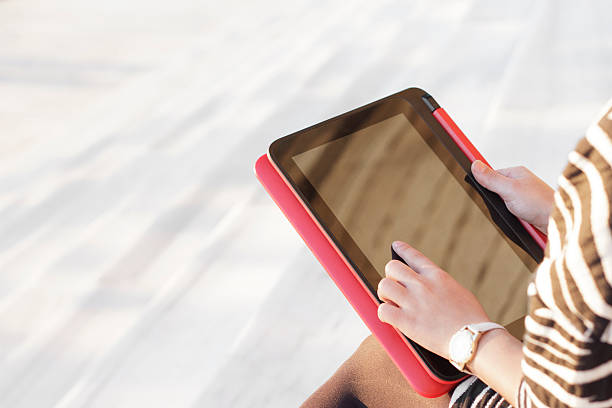 istock The young woman using the tablet 496946304