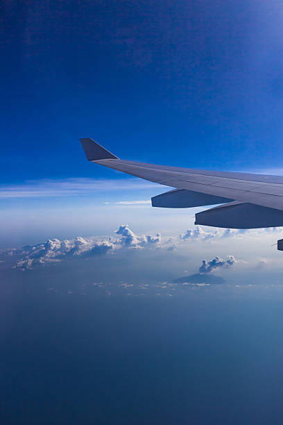 istock Blue skies over a volcanic eruption 496946825
