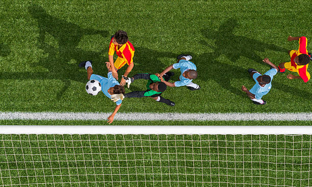 istock Young Footballers In Action 496947723