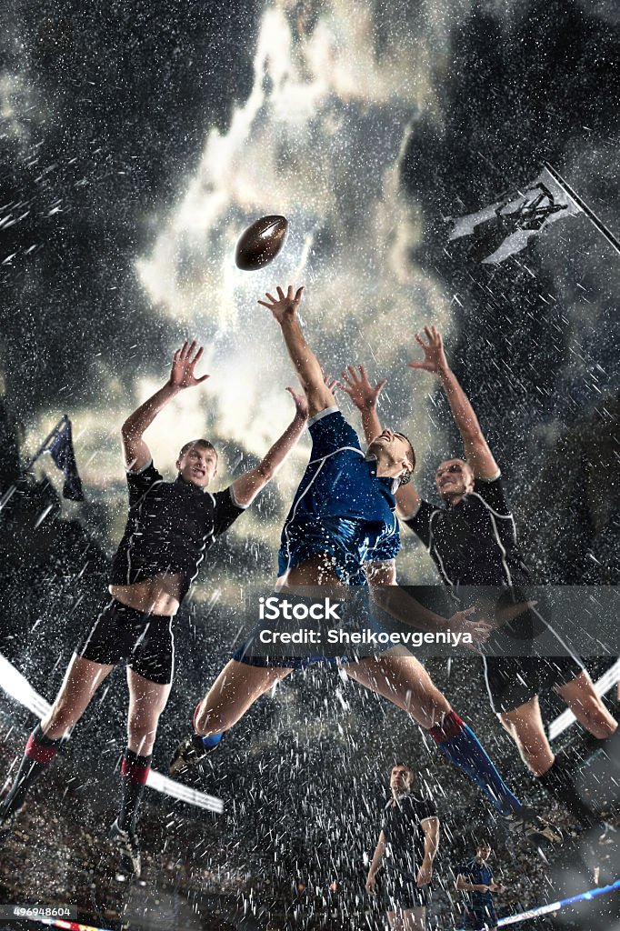 competition players Rugby in the rain Sports, game, fighting, rain, stadium - Rugby players on a stadium Rugby - Sport Stock Photo