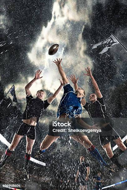 Competition Players Rugby In The Rain Stock Photo - Download Image Now - Rugby - Sport, Motion, Playing