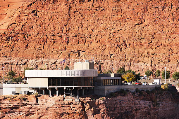 Tourist Visitor Center Glen Canyon Dam Carl Hayden Visitor Center with tourist exhibits of Glen Canyon Dam and Lake Powell in the Glen Canyon National Recreation Area.  Page, Arizona, 2015. glen canyon dam stock pictures, royalty-free photos & images