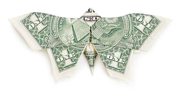 istock Dollar origami butterfly isolated on white background 496950690