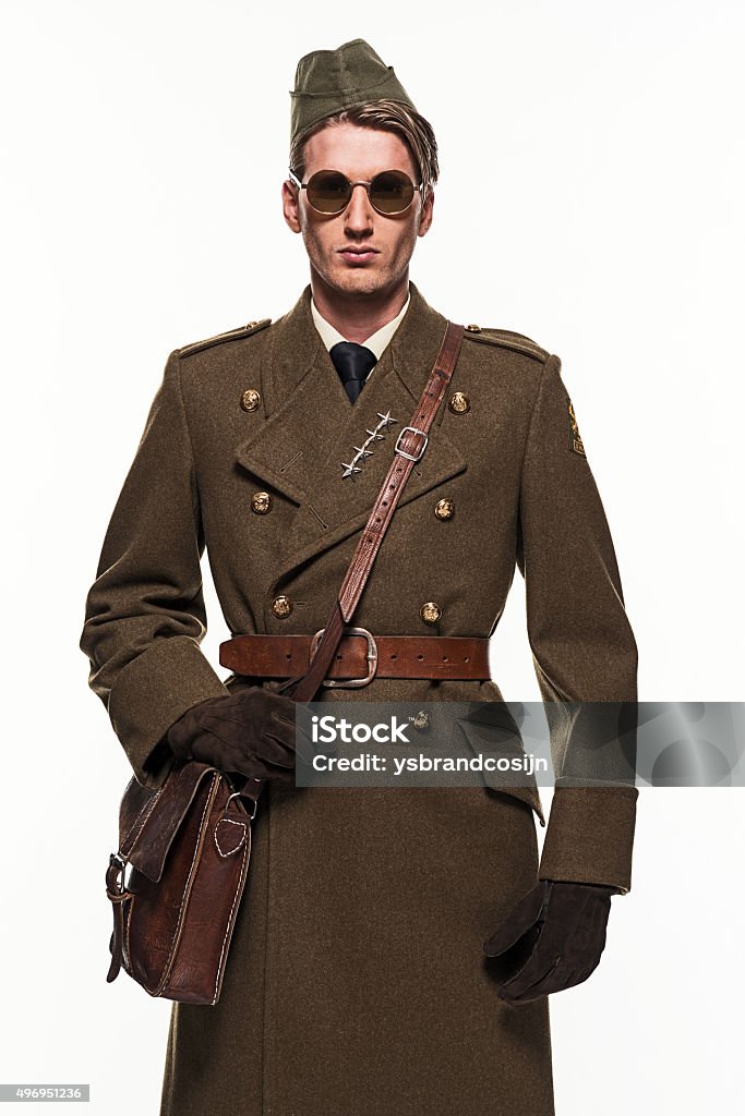 Military uniform fashion man against white background. 1940-1949 Stock Photo