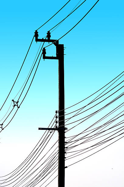 istock electricity post with many wire, dreamy color background 496951820