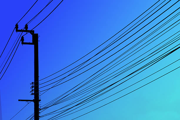 istock electricity post with many wire, dreamy color background 496951868