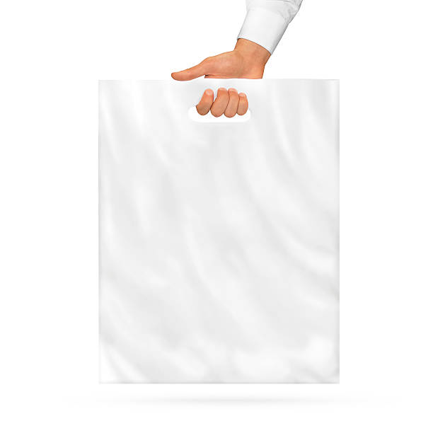 istock Blank plastic bag mock up holding in hand. 496952318