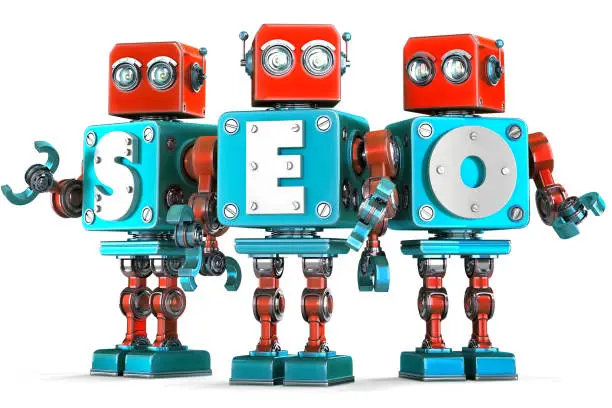 Photo of Group of vintage robots with SEO sign. Isolated. Clipping path