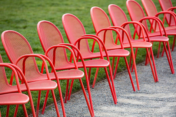 istock Red metal chair at an angle 496958918