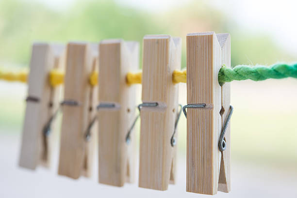 istock wooden clothespin hanging on rope 496961246