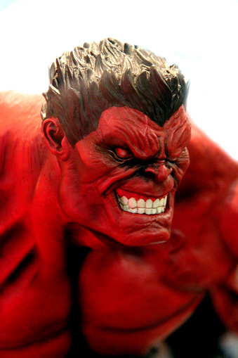 Vancouver, Canada - October 12, 2015: A statuette of the Red Hulk against a white background.