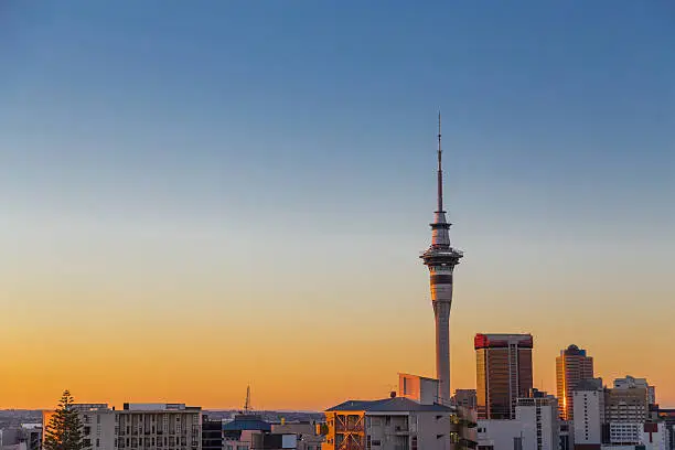 Sun setting on Auckland's tallest building, the Sky Tower.