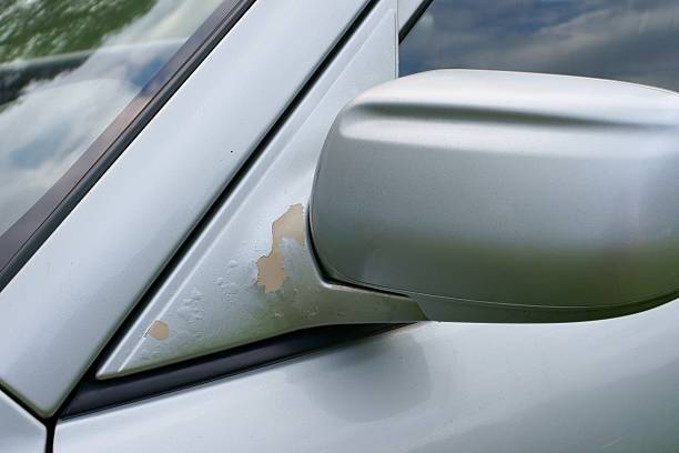 istock The car, peeling paint at rear-view mirror 496974305