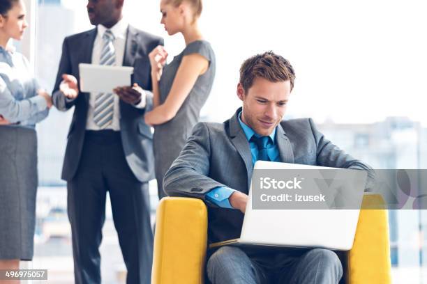 Businessman With Laptop Stock Photo - Download Image Now - Occupation, 20-24 Years, Adult