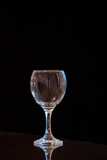 istock clean transparent watter glass on black background 496975232
