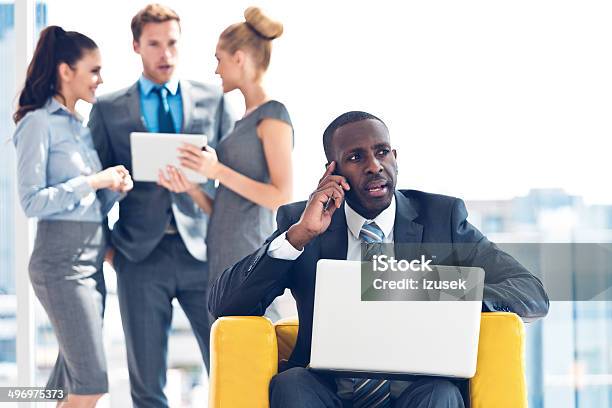Businessman At Work Stock Photo - Download Image Now - Discussion, Professional Occupation, Talking