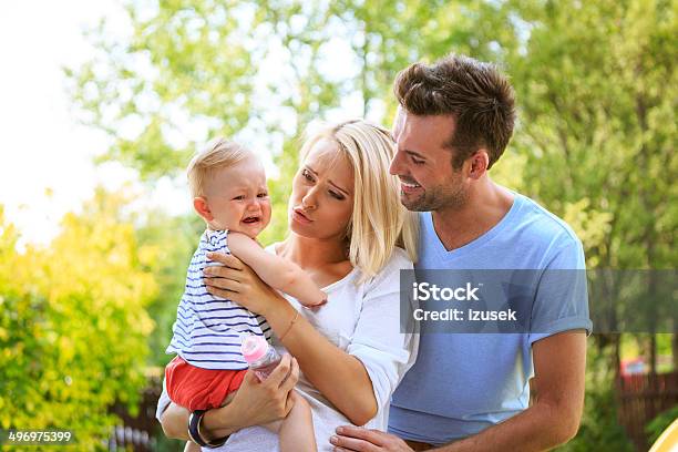 Couple With Baby Stock Photo - Download Image Now - 6-11 Months, Adult, Affectionate