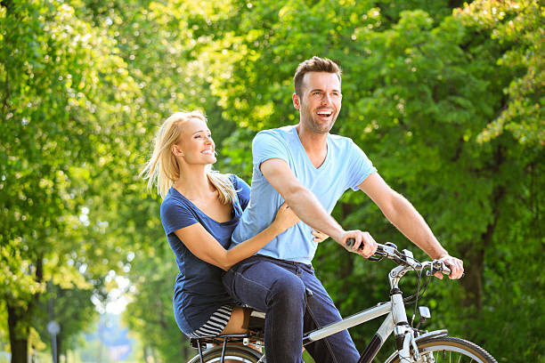 istock Happy couple in a park 496975421