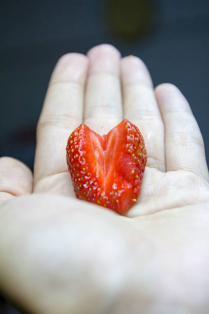 adstract strawberry on hand stock photo