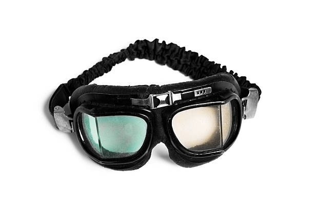 istock Vintage retro motorcycle and airplane goggles on white 496981250