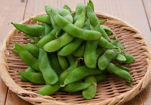 istock japanese cuisine, boiled green soybeans 496981406