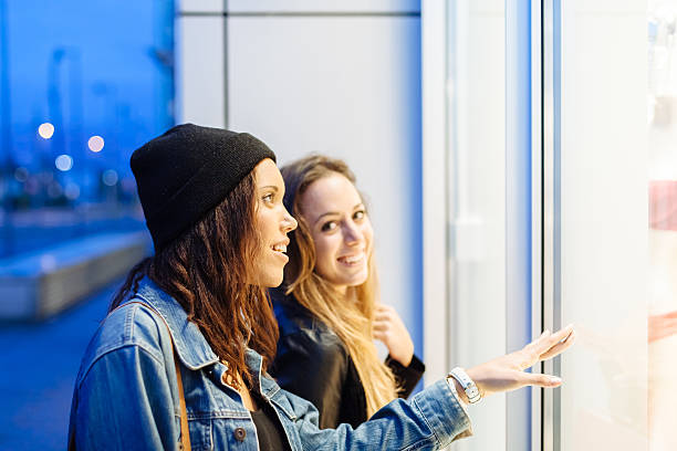 istock Two women friends doing shopping 496983380