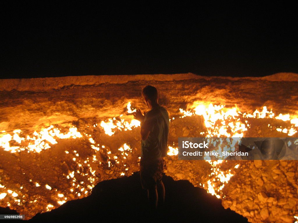 The Gates of Hell The Gates of Hell, at Derweze, Turkmenistan. In the Turkmenistan desert is an old Soviet Gas Facility which collapsed due to subsidence. The Soviet's set the emitting gas on fire hoping it would burn itself out. That was nearly 50 years ago, and it still burns today, creating a beacon of light that can be seen from miles around. Turkmenistan Stock Photo