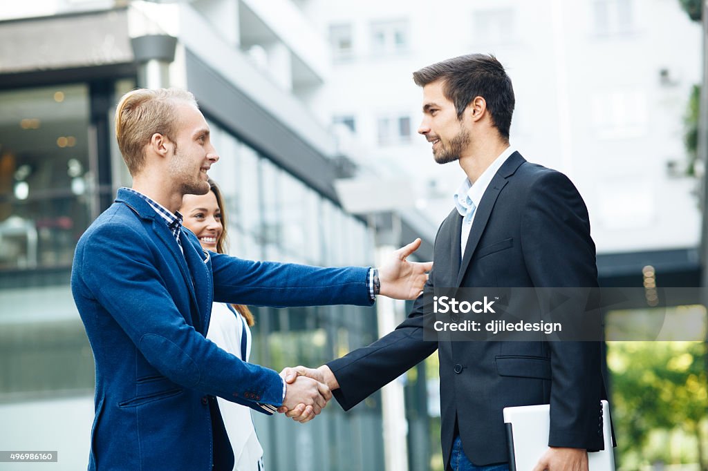 Business people handshake outdoor 2015 Stock Photo