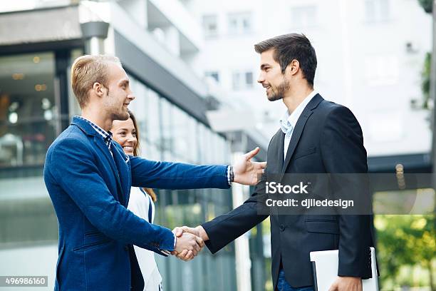 Business People Handshake Outdoor Stock Photo - Download Image Now - 2015, Adult, Adults Only