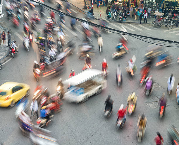 istock Busy chaotic traffic Hanoi Vietnam Motion blurred 496989499